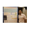 Student from the University of Aveiro, Portugal, next to his poster at CETS'2013